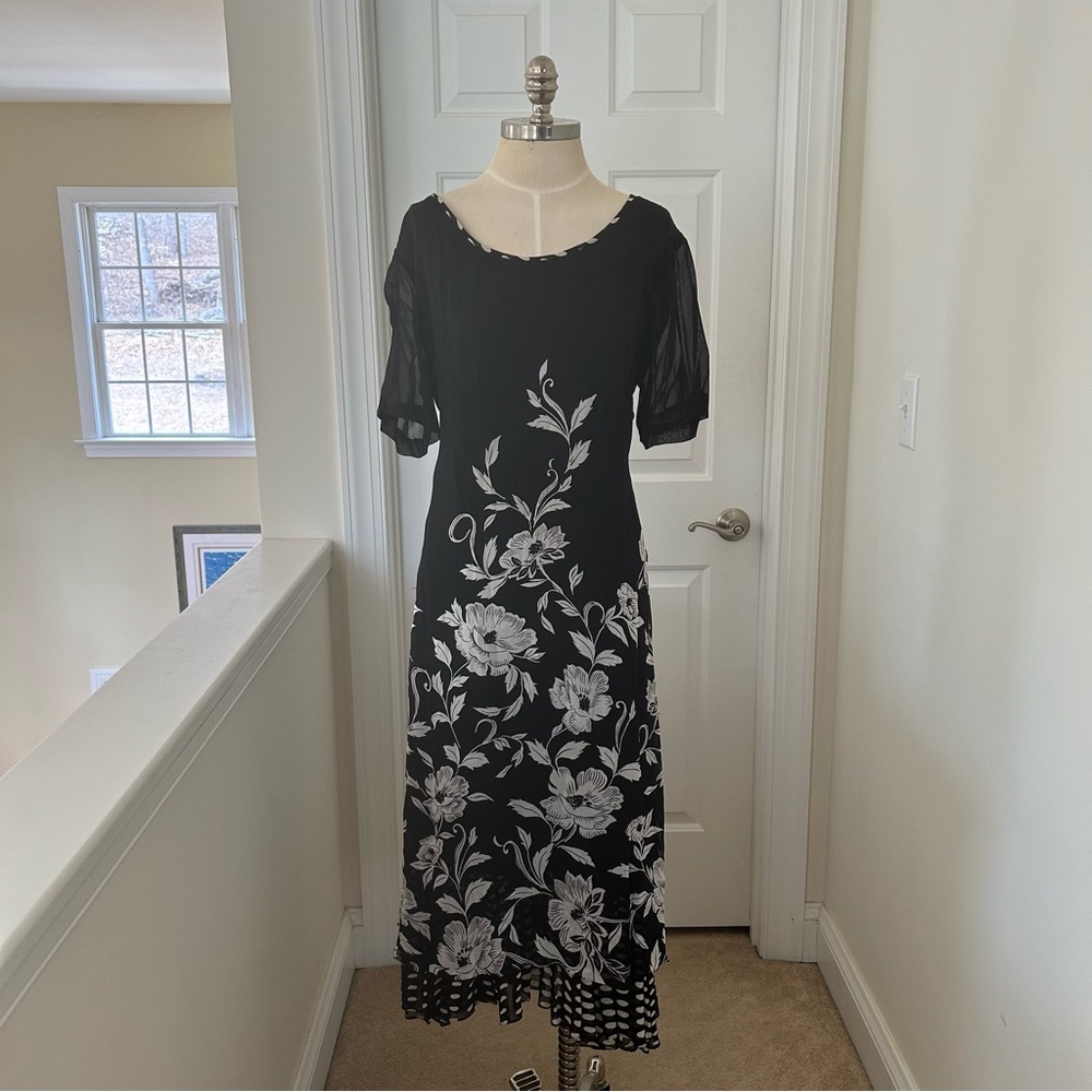 LOLA P. Black and white floral maxi dress with sheer sleeves and beaded details